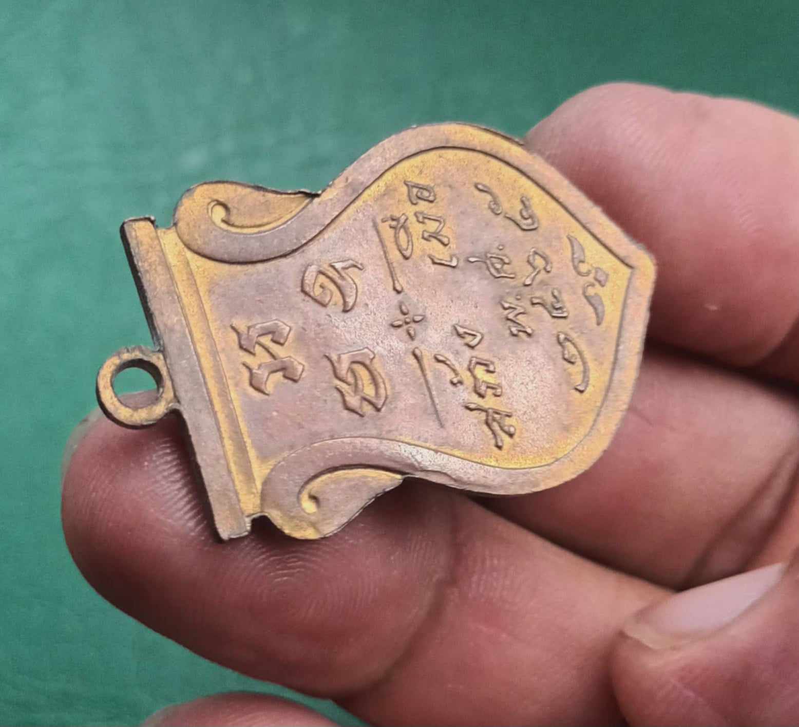 เหรียญเสมาองค์พระปฐมเจดีย์ รุ่นแรก ปี 2465เนื้อทองแดงผิวไฟ