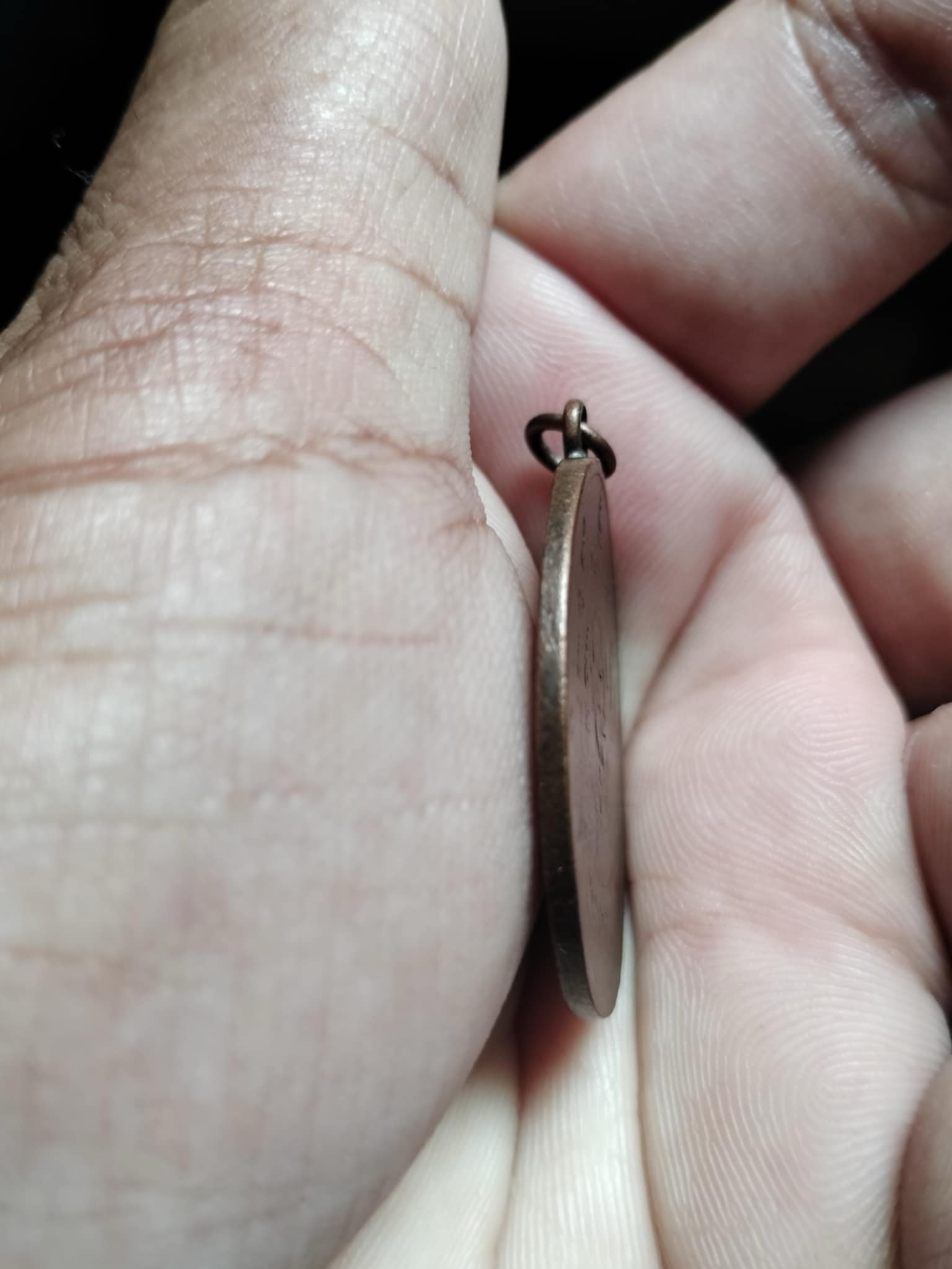 เหรียญหลวงพ่อหรุ่น เก้ายอด วัดอัมพวัน รุ่นแรก พ.ศ.2469