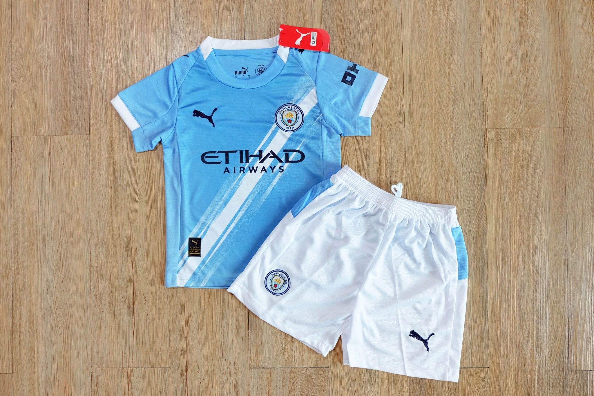 ชุดฟุตบอลเด็ก – ทีมเเมนซิ สีฟ้า Fans Edition เกรดเเฟนบอล 2025
