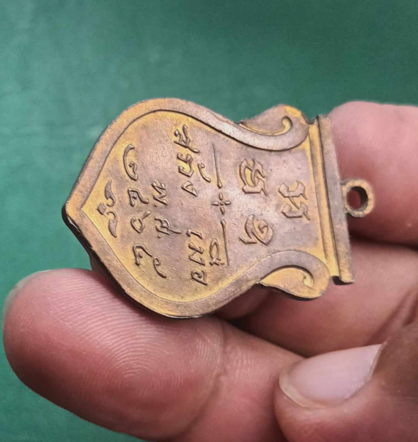 เหรียญเสมาองค์พระปฐมเจดีย์ รุ่นแรก ปี 2465เนื้อทองแดงผิวไฟ