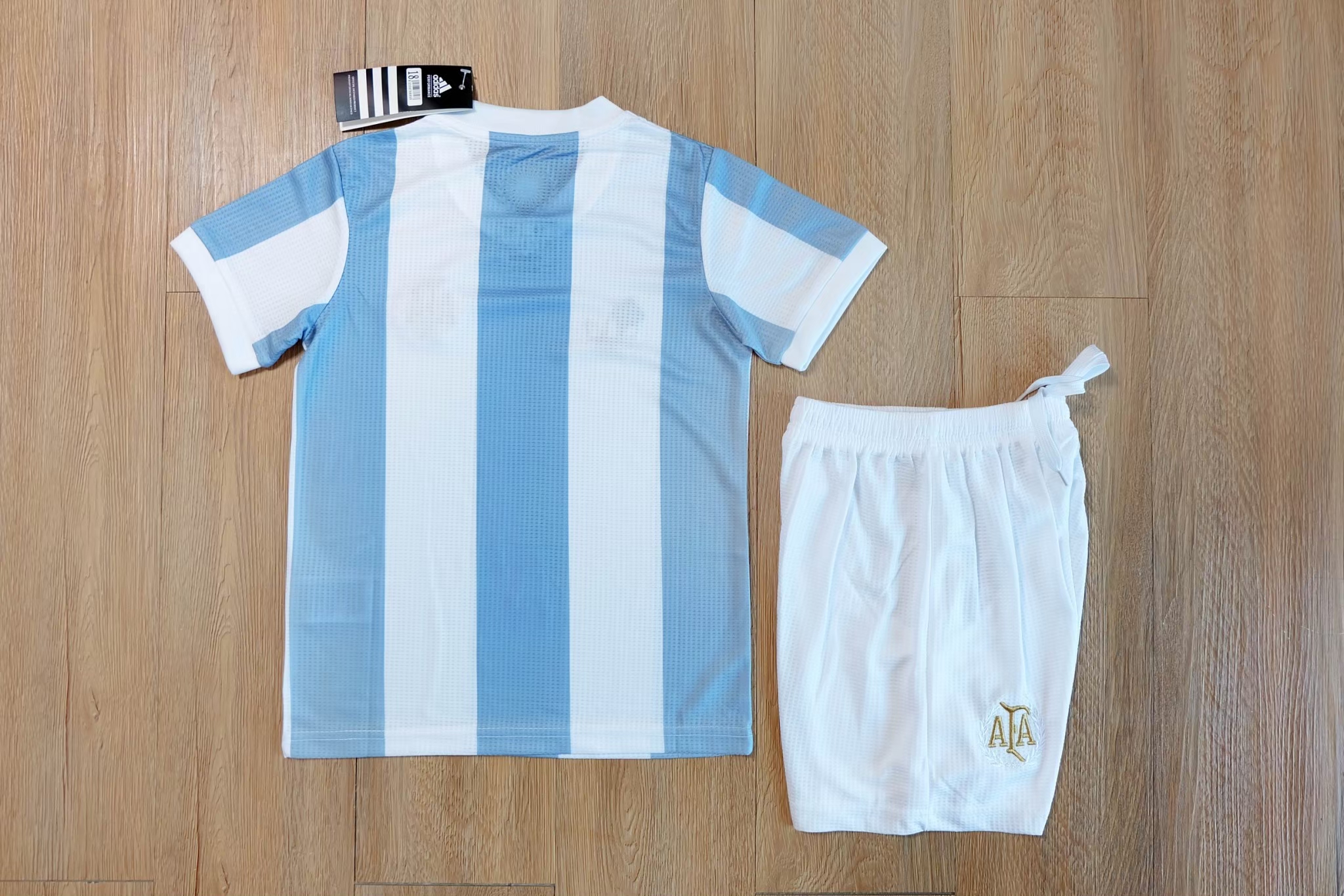 ชุดฟุตบอลเด็ก – 2025-26 ชุดฟุตบอลเด็กทีมชาติอาเจนฯ สีฟ้า สำหรับเด็ก Fans Edition เกรดเเฟนบอล Size 18-28