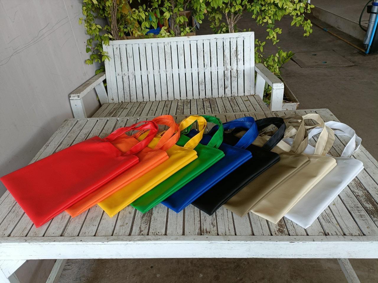 กระเป๋าหนังเทียม SP011