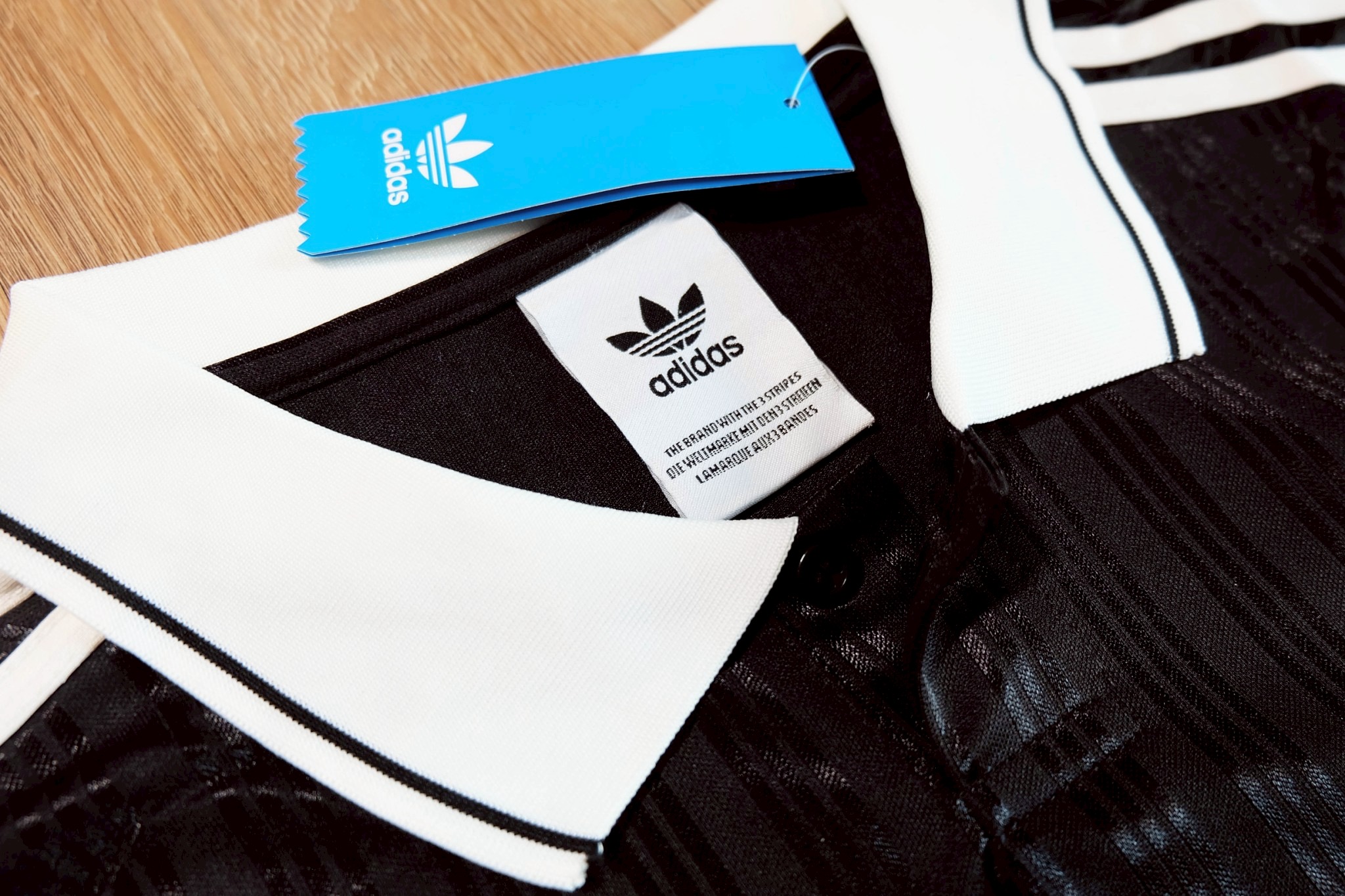 เสื้อเชิ้ตผู้ชายสีดำ/ฟ้า Oasis Special Edition พร้อมเบอร์ 25 เกรดเเฟนบอลพรีเมี่ยม 2025