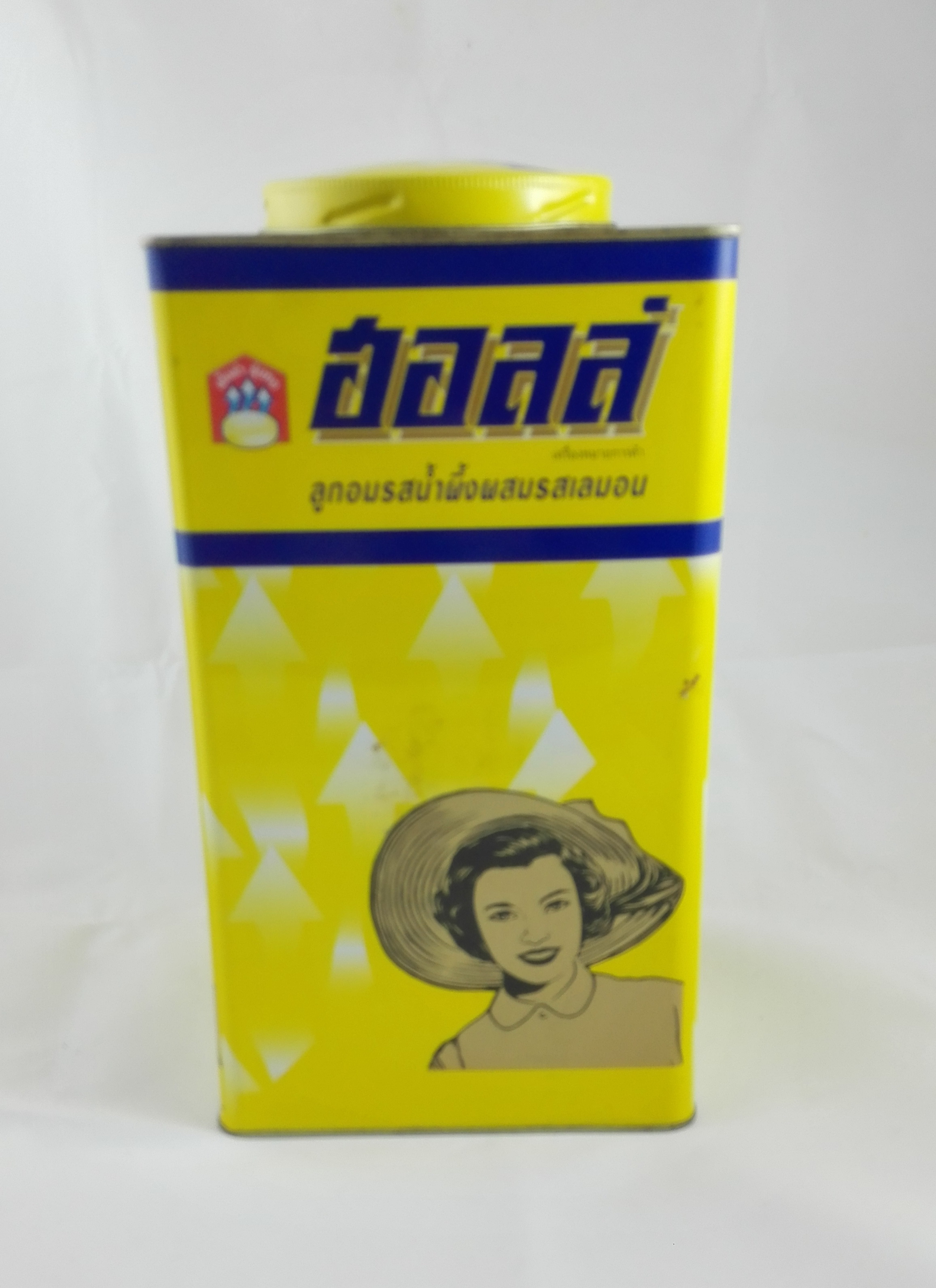 กระป่องฮอลล์ ลูกศร สีเหลือง รสน้ำผึ้งผสมเลมอน