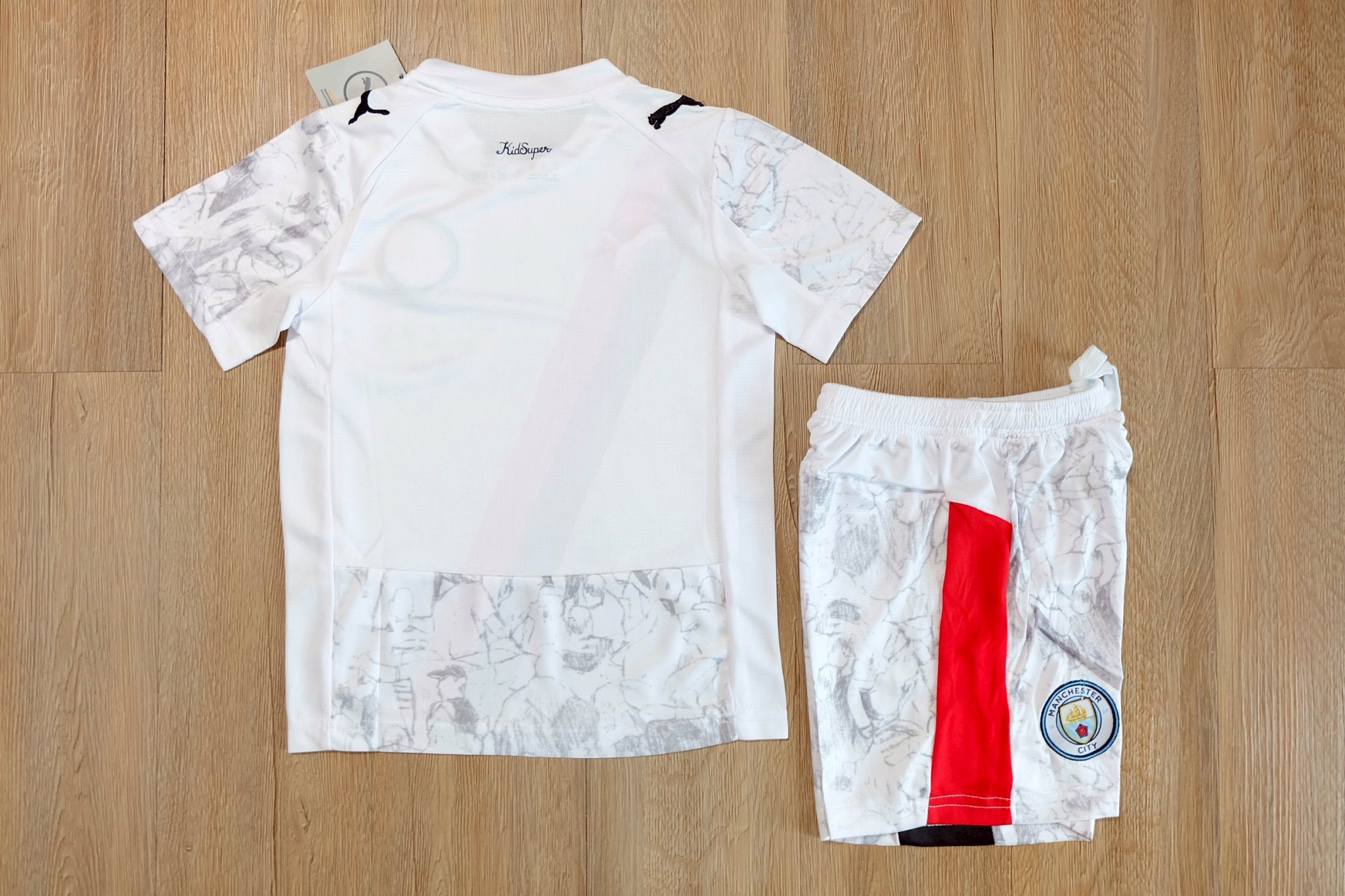 ชุดฟุตบอลเด็ก – 2025-26 ชุดฟุตบอลเด็กเเมนซิ สีขาว สำหรับเด็ก Fans Edition เกรดแฟนบอล Size 18-28