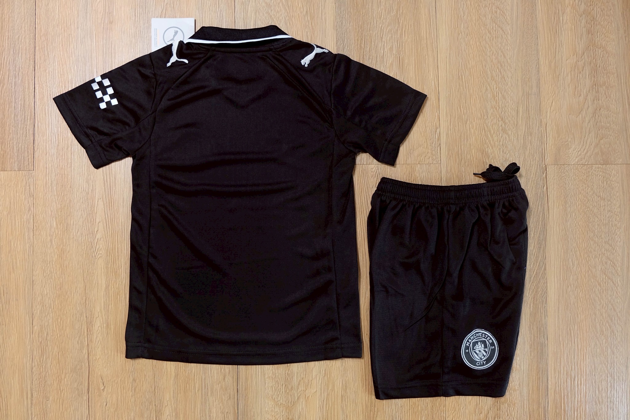 ชุดฟุตบอลเด็ก – 2025-26 ชุดฟุตบอลเด็กเเมนซิ สีดำ สำหรับเด็ก Fans Edition เกรดแฟนบอล Size 18-28