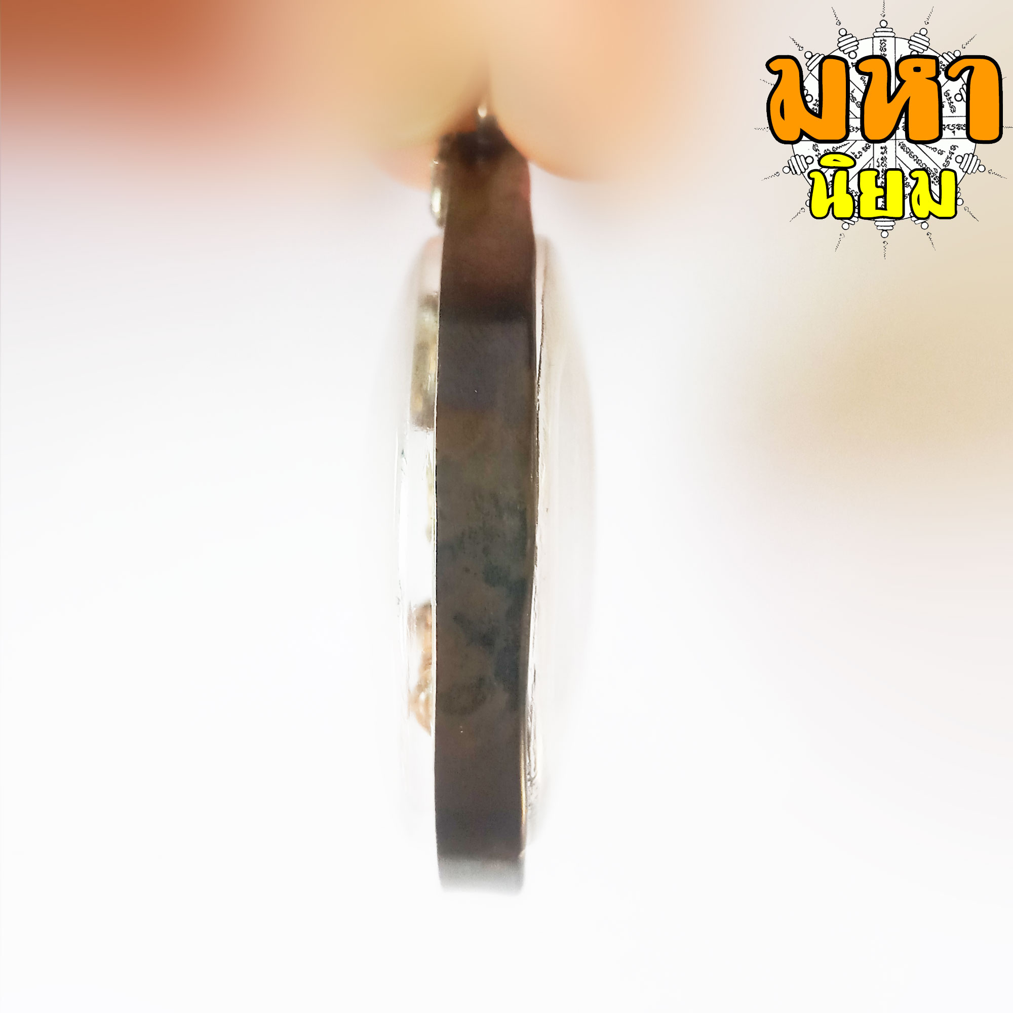 หลวงพ่อทวด เก้ามงคล เลี่ยมกรอบโลหะ ไม่ทราบที่มาแน่ชัด