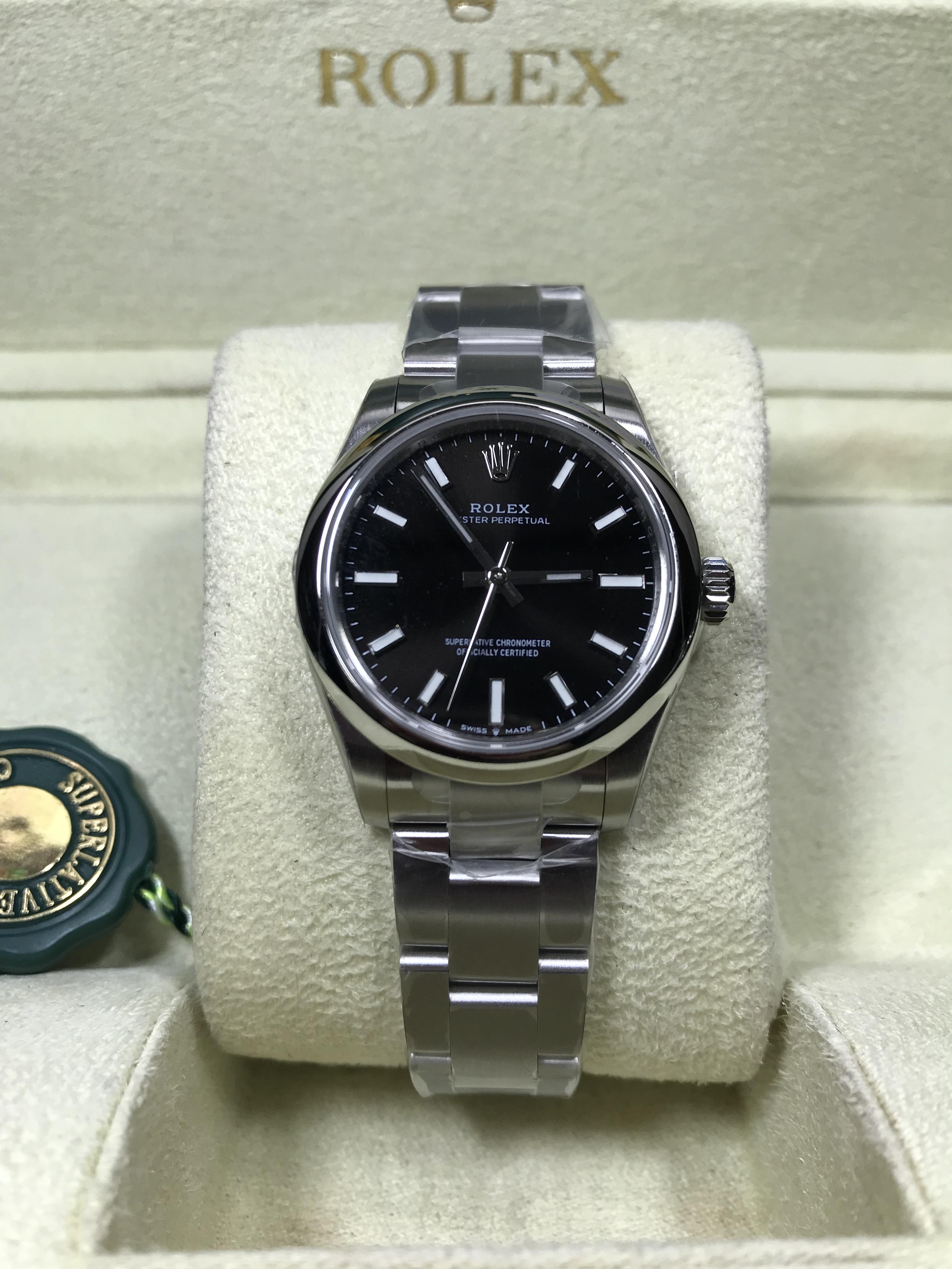 Rolex Oyster Perpetual (Swiss EW)
