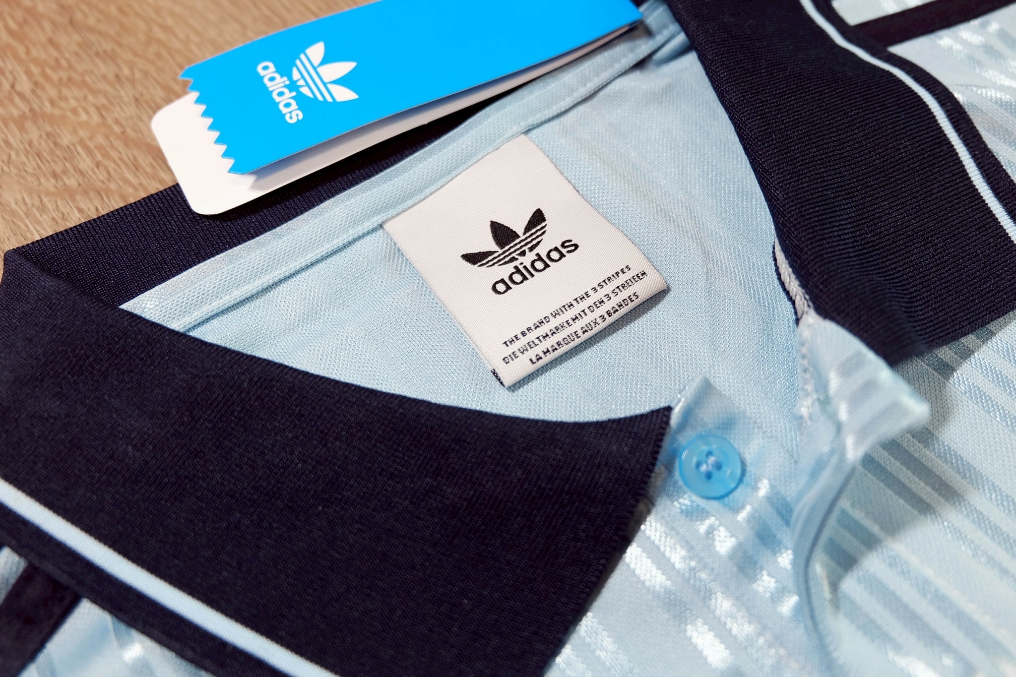 เสื้อเชิ้ตผู้ชายสีดำ/ฟ้า Oasis Special Edition พร้อมเบอร์ 25 เกรดเเฟนบอลพรีเมี่ยม 2025