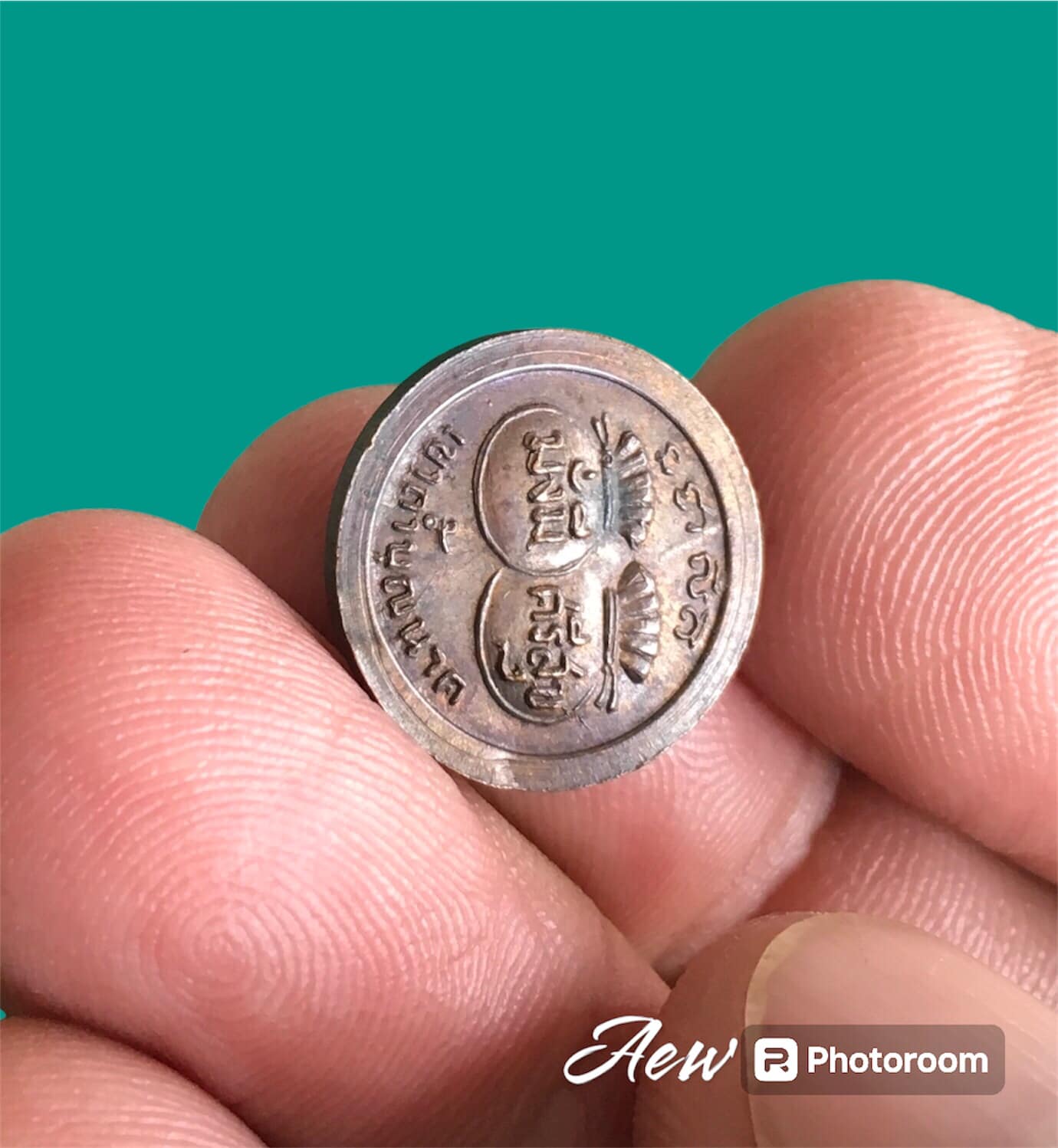 เหรียญขวัญถุง มั่งมีศรีสุข หลวงปู่สี ฉันทสิริ วัดเขาถ้ำบุญนาค จ.นครสวรรค์ ปี 2519 เป็นเหรียญกลมเล็ก