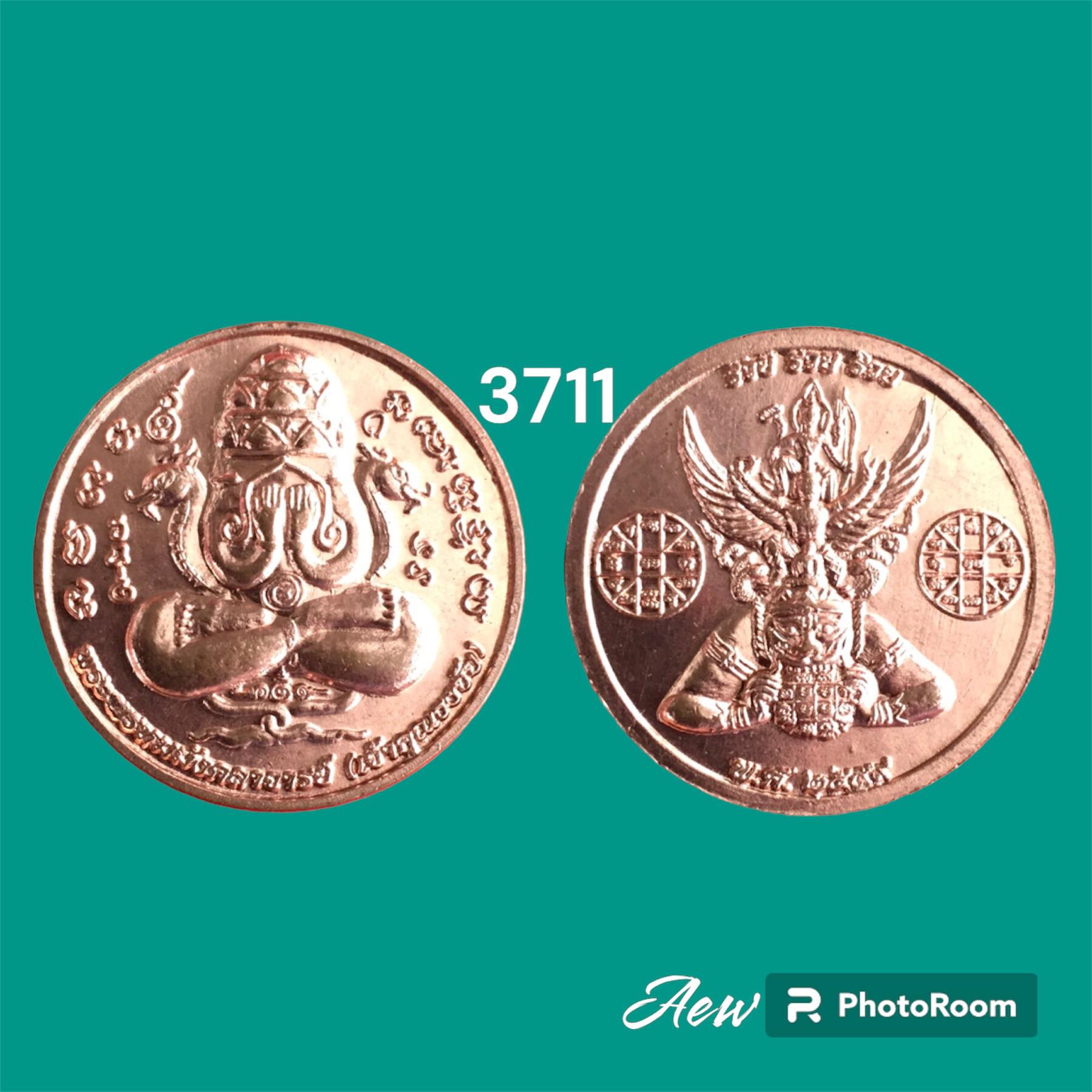 เหรียญทองแดง ปิดตาพังพกาฬ หลังพระนารายณ์ทรงครุฑประทับบนพระราหู รุ่น รวย รวย รวย เจ้าคุณธงชัย วัดไตรมิตรวิทยารามวรวิหาร กรุงเทพมหานคร ปี 2559
