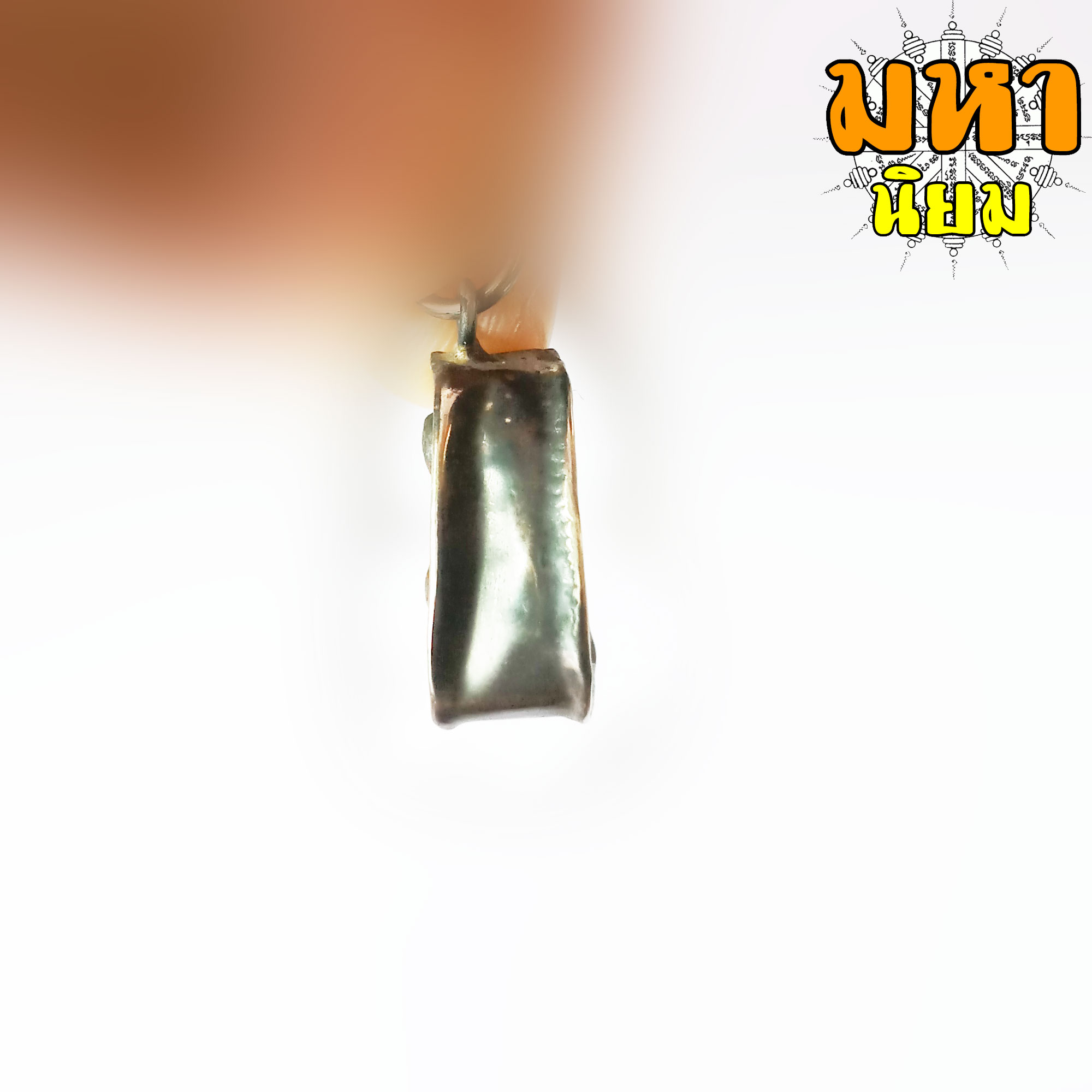 พระปิดตา หลวงพ่อแก้ว วัดเครือวัลย์ จ.ชลบุรี เลี่ยมกรอบโลหะ ไม่ทราบที่มาแน่ชัด