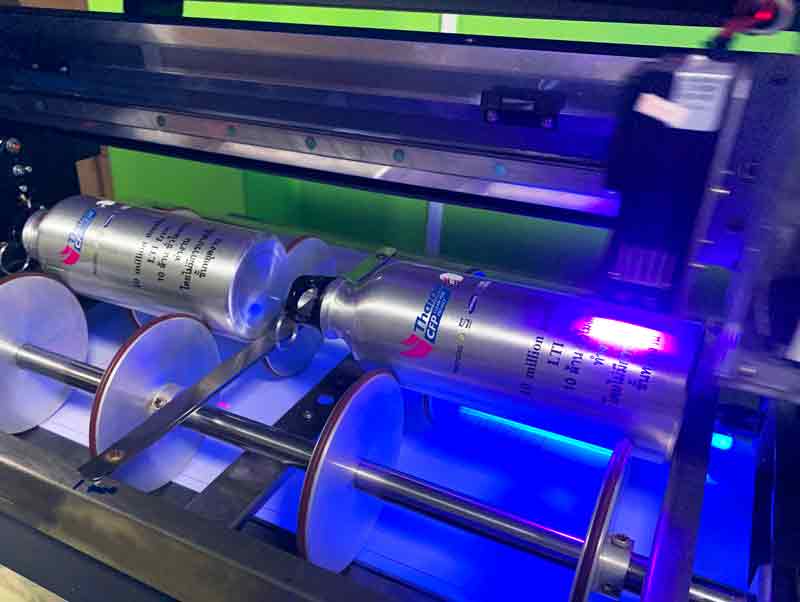 พิมพ์กระบอกน้ำ 4 สี รอบใบ