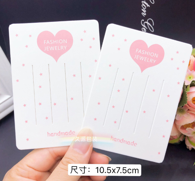 PP004 แป้นกิ๊บสีขาวรูปหัวใจ ขนาด 7.5x10.5 ซม. (แพค 100 ใบ)