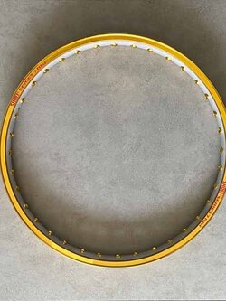 สกรีนขอบล้อ พิมพ์ขอบล้อ ทำโลโก้ล้อมอเตอร์ไซด์