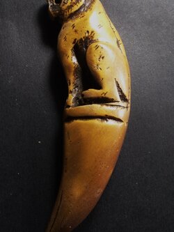 เขี้ยวแกะเก่ารูปเสือ