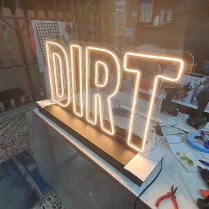 ป้ายนีออนฟรค สีวอมไวท์ DIRT